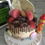 sweets and chocolate drip cake
