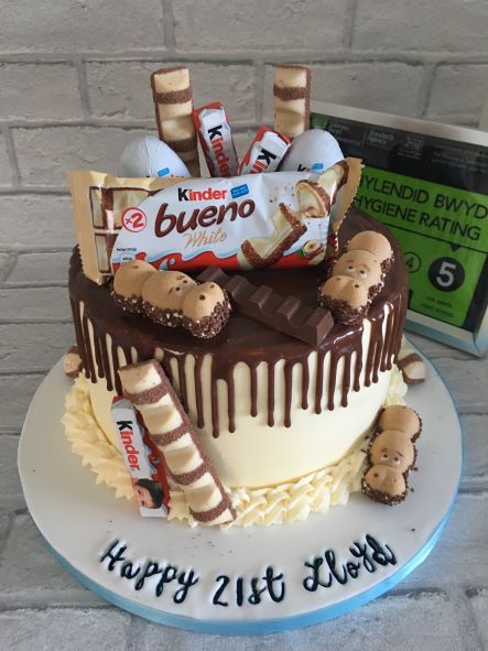 chocolate drip cake with chocolates on top